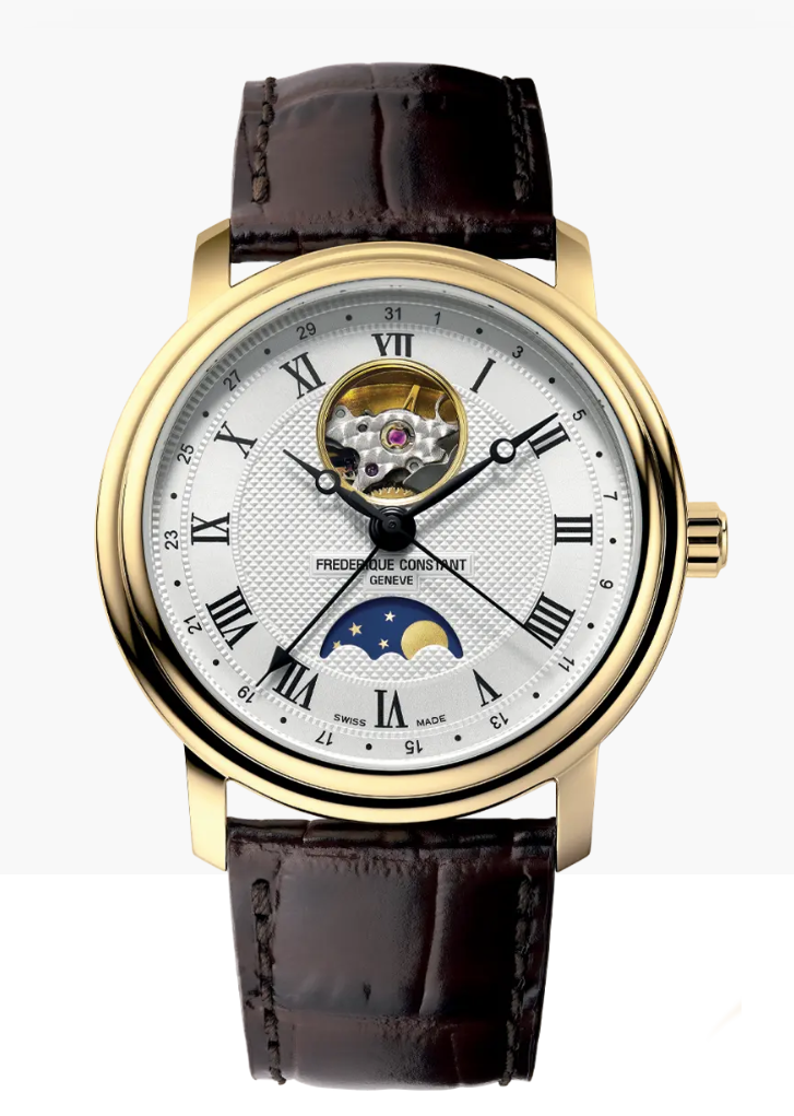 Frederique Constant Classics Heart Beat Moonphase Date is uitgerust met het FC-335 Automatic uurwerk.
heeft een rijkelijk versierde witte wijzerplaat met een klassieke Clous de Paris Guiloché versiering en is uitgevoerd met traditionele Romeinse cijfers. De wijzerplaat heeft een doorbraak onder de 12 wat zich kenmerkt  voor de Heart Beat-uurwerken. Gangreserve 38 uur.  Kast 40mm 6 ATM waterdicht. Maanstand en datum aanduiding. Bruin lederen band